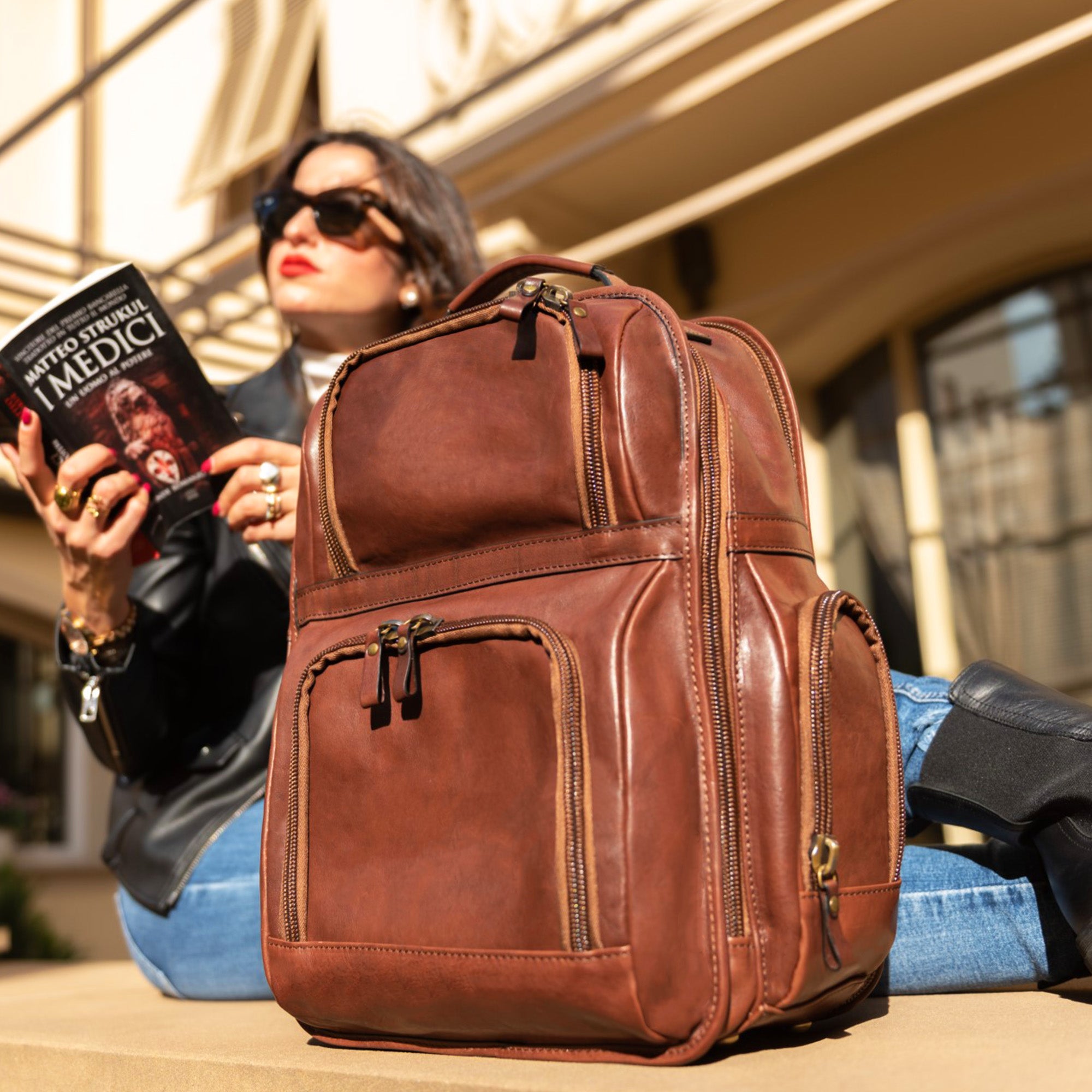 Brown leather travel outlet backpack